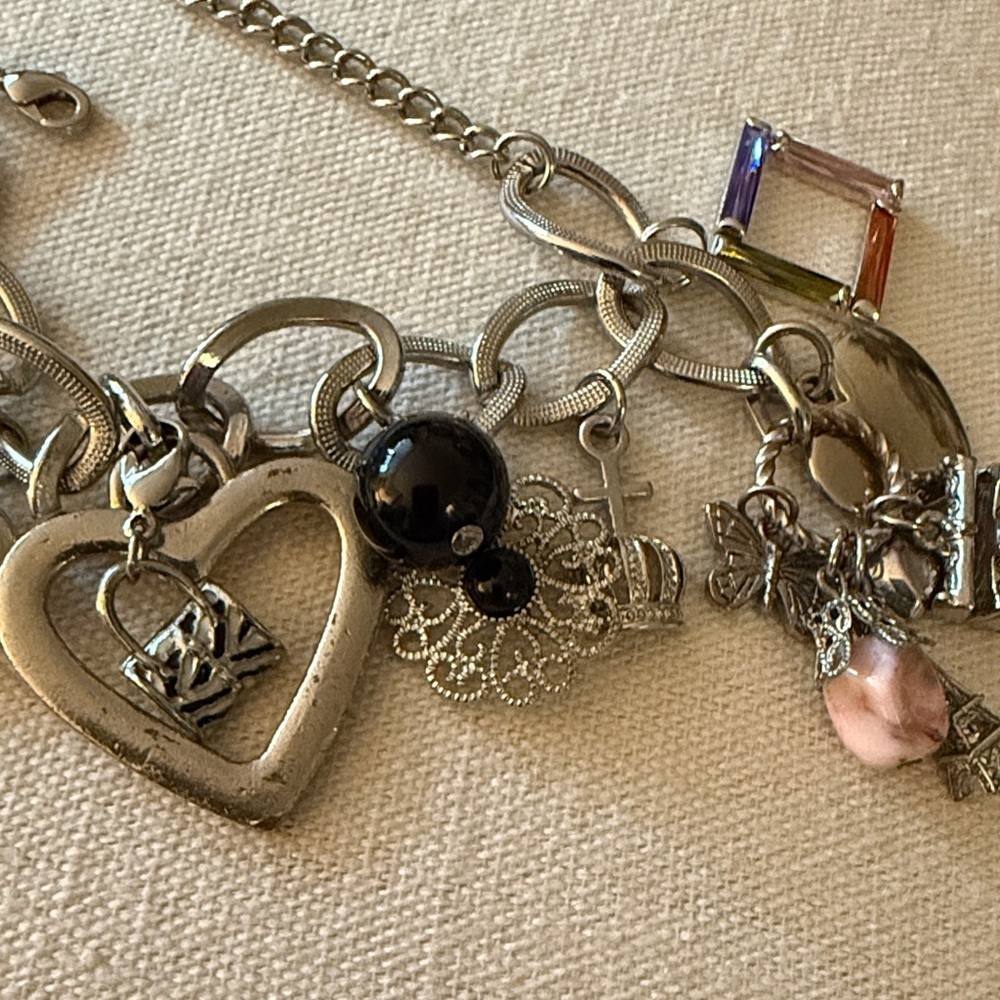 Silver-tone Adjustable Charm Bracelet with 12 charms. - Picture 3 of 8